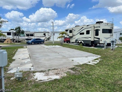 Vacant lot with a concrete slab, electric, and sewer already in - photo 7