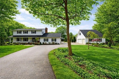 Set amidst over 5 acres of breathtaking, manicured grounds, this - photo 1
