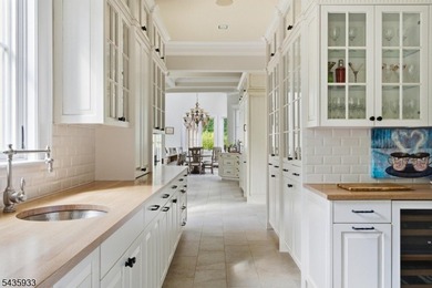 An architectural masterpiece by Jeffrey A. Beer A.I.A., this - photo 20