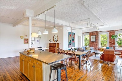 Live above the vibe of the West Side, a block from Downtown - photo 8