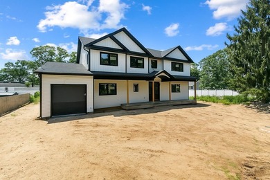 Stunning New Construction in West Babylon, NY. Discover the - photo 1