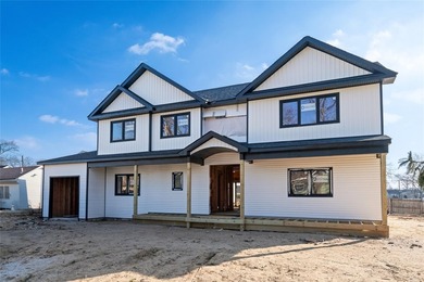 Stunning New Construction in West Babylon, NY. Discover the - photo 2