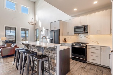 This modern four-bedroom single-family home in Granby Ranch - photo 13
