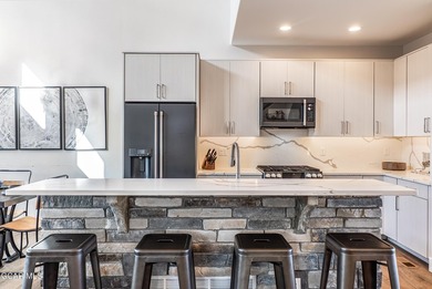 This modern four-bedroom single-family home in Granby Ranch - photo 14