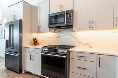 This modern four-bedroom single-family home in Granby Ranch - photo 15