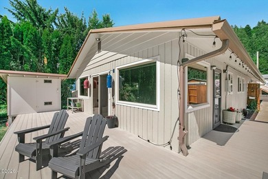 Experience the best of riverfront living in this charming - photo 16