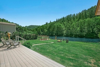 Experience the best of riverfront living in this charming - photo 19