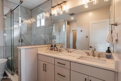 This modern four-bedroom single-family home in Granby Ranch - photo 32