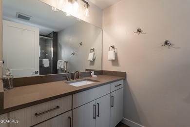 This modern four-bedroom single-family home in Granby Ranch - photo 54