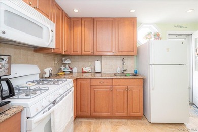 Welcome to 198-15 33rd Ave, a charming single-family home tucked - photo 11