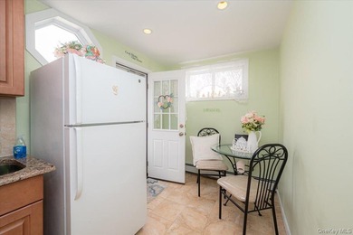 Welcome to 198-15 33rd Ave, a charming single-family home tucked - photo 12