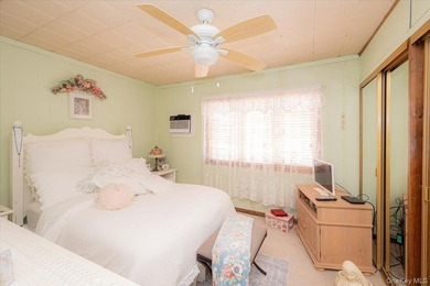 Welcome to 198-15 33rd Ave, a charming single-family home tucked - photo 18