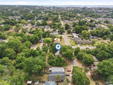 Situated on a corner lot and adorned with majestic oak trees - photo 36