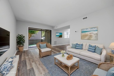 Discover easy coastal living in this beautifully renovated - photo 2
