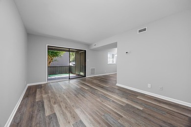 Discover easy coastal living in this beautifully renovated - photo 3