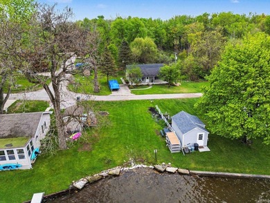 Enjoy year round living in this 940 sq.ft. gem, that has been - photo 4