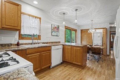 Enjoy year round living in this 940 sq.ft. gem, that has been - photo 10