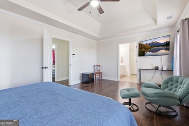 Beautiful brick front 4 bedroom, 4 full bathroom home featuring