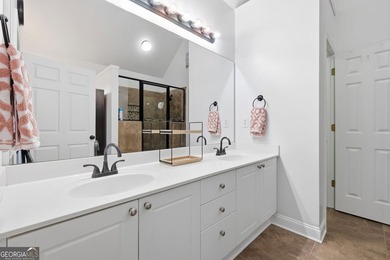 Beautiful brick front 4 bedroom, 4 full bathroom home featuring