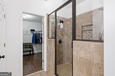 Beautiful brick front 4 bedroom, 4 full bathroom home featuring