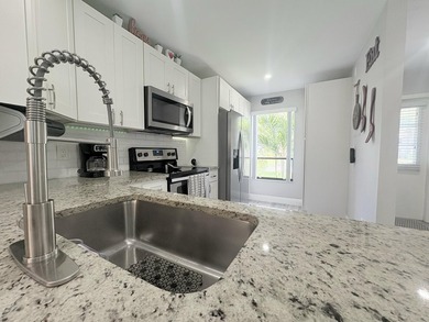 Welcome to this inviting 2-bedroom, 1.5-bath townhouse located - photo 33