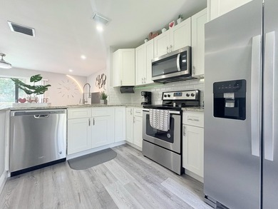Welcome to this inviting 2-bedroom, 1.5-bath townhouse located - photo 34