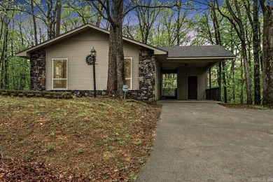 Tucked among the trees in the desirable Diamondhead community - photo 1