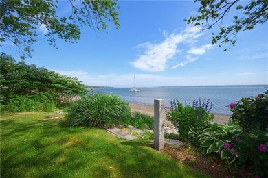 Tucked away on a quiet cul-de-sac, this exceptional waterfront - photo 1