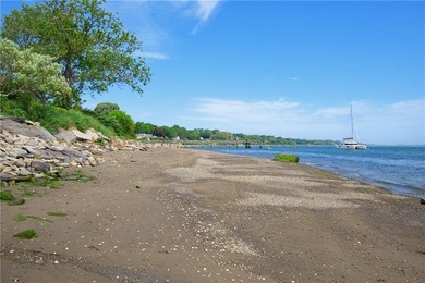 Tucked away on a quiet cul-de-sac, this exceptional waterfront - photo 3