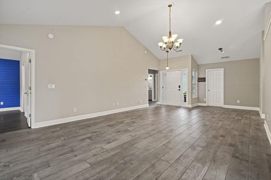 Welcome to 262 Palladium Drive, a beautifully maintained custom - photo 5