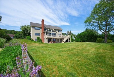 Tucked away on a quiet cul-de-sac, this exceptional waterfront - photo 5