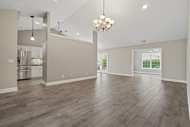 Welcome to 262 Palladium Drive, a beautifully maintained custom - photo 6
