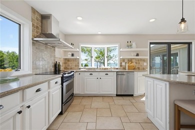 Tucked away on a quiet cul-de-sac, this exceptional waterfront - photo 8