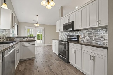 Welcome to 262 Palladium Drive, a beautifully maintained custom - photo 9