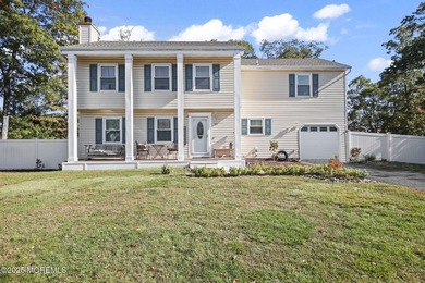 WOW! This 4 bed, 2.5 bath colonial in one of Brick's best - photo 1