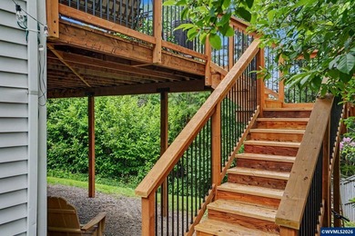 !IMPROVED PRICE! Nestled among the trees, this beautifully - photo 37