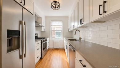 Legal 2-family Forest Hills Tudor Home with great income - photo 8