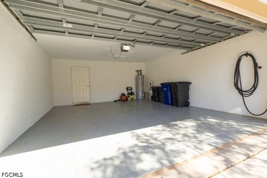 An open concept floor plan with a water view makes this coach - photo 7