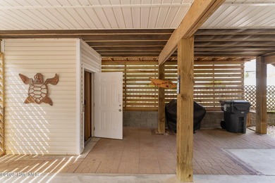 Welcome to this beautiful 3-bedroom, 2 bath FURNISHED coastal