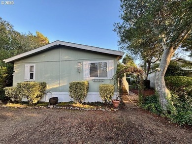 Tucked into the welcoming Coast Village community, this charming - photo 3