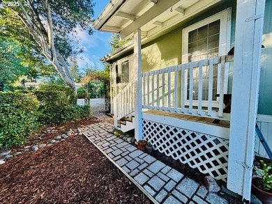 Tucked into the welcoming Coast Village community, this charming - photo 4