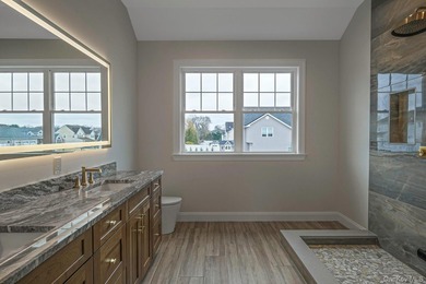 Partner with one of Long Island's East End premier builders and - photo 10