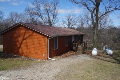 Here's a gem of a lake home off the beaten path! 50 feet of - Lake Home Sale Pending in Brooklyn, Iowa