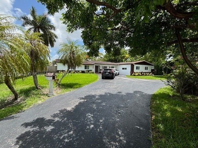 Tropical Oasis Near University of Miami! Step into this stunning - photo 1