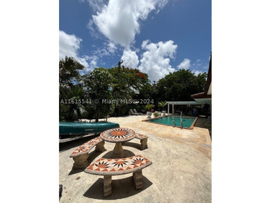 Tropical Oasis Near University of Miami! Step into this stunning - photo 3