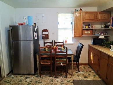 This quaint 2-bedroom, 2-bath home sits on nearly one acre and - photo 8
