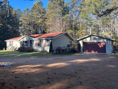 Boot Lake - Vilas County Home Active Under Contract in Eagle River Wisconsin