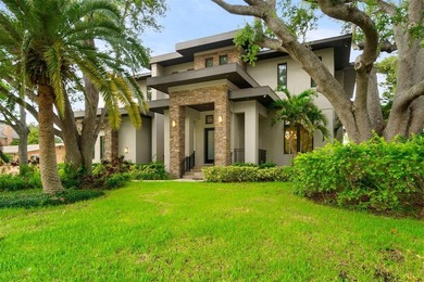 Welcome to an exceptional waterfront residence positioned in one - photo 1
