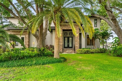 Welcome to an exceptional waterfront residence positioned in one - photo 4