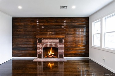 Welcome home to this beautifully renovated 4 bedroom, 2 full - photo 7